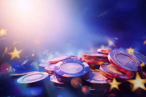 A glamorous woman holding casino chips in a neon-lit environment, representing the premium online casino atmosphere of 100JL.